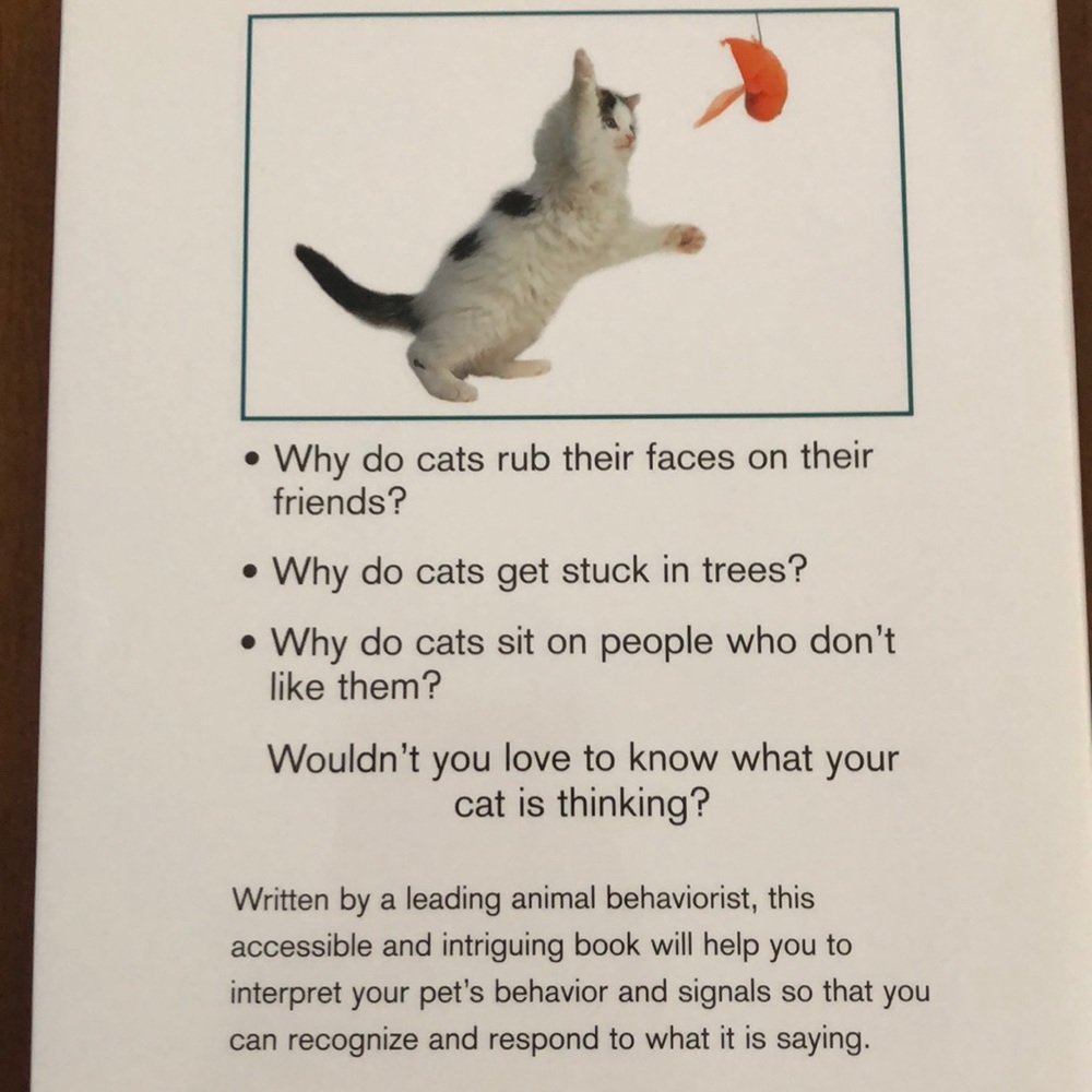Hardcover Cat Behavior Book - Picture 2 of 3